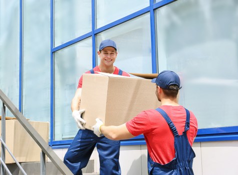 House removals in Shoreditch with moving van in an urban street